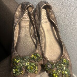 Elegant Gold Ballet Flats with Green Embellishments